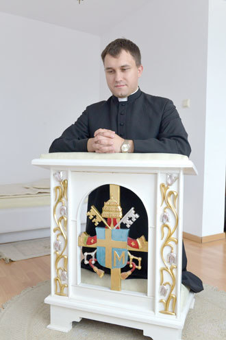ks. Slezak