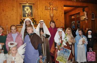 W strojach swoich patronów